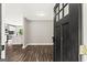 Inviting entryway into a naturally lit, open-concept living space with hardwood flooring at 2835 Laguna Dr, Decatur, GA 30032