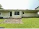 Exterior of the home with a concrete patio at 4540 Lindsey Dr, Powder Springs, GA 30127