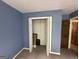 Bedroom with closet featuring ample storage and neutral carpeting at 4540 Lindsey Dr, Powder Springs, GA 30127