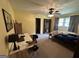 Large bedroom with a ceiling fan and plenty of space for both sleeping and working at 4540 Lindsey Dr, Powder Springs, GA 30127
