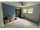 A spacious bedroom with natural light, closet, and neutral carpet, ready for personalization at 4540 Lindsey Dr, Powder Springs, GA 30127