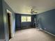 Bedroom featuring ample natural light, ceiling fan and neutral carpeting at 4540 Lindsey Dr, Powder Springs, GA 30127