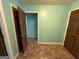 Hallway leading to a cozy space, with doors adding privacy and function at 4540 Lindsey Dr, Powder Springs, GA 30127