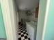 Functional laundry room with washer, dryer and ample storage at 4540 Lindsey Dr, Powder Springs, GA 30127