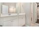 Bright bathroom featuring a double vanity and neutral color palette at 8041 Louis Dr, Locust Grove, GA 30248