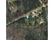 Aerial view of a wooded parcel next to Haynie Road with property lines displayed at 465 Haynie Rd, Moreland, GA 30259