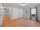 Bright bedroom with a large closet and wood-look flooring at 465 Haynie Rd, Moreland, GA 30259