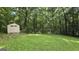 Backyard storage shed on level lot, great for storing tools and equipment at 465 Haynie Rd, Moreland, GA 30259