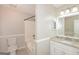 Bright bathroom featuring a tub shower and granite vanity top at 2090 Blackberry Ln, Auburn, GA 30011