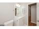 Bathroom featuring a single vanity, tile floors and updated fixtures at 2090 Blackberry Ln, Auburn, GA 30011