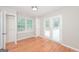 Cozy bedroom with hardwood floors, natural light, and a closet at 2090 Blackberry Ln, Auburn, GA 30011