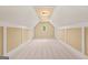 Bonus room with neutral walls, an oval window, and soft carpet, creating a versatile space at 917 Saints Ct, Marietta, GA 30068
