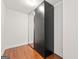 Closet with hardwood floors and built-in closet organizer, offering efficient storage solutions at 917 Saints Ct, Marietta, GA 30068