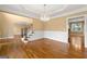 Formal dining room with hardwood flooring, chandelier, and stairs in view at 917 Saints Ct, Marietta, GA 30068