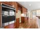 Modern kitchen with stainless steel appliances, ample storage, and a wine rack at 917 Saints Ct, Marietta, GA 30068