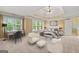 The main bedroom boasts natural light, ample seating, dedicated desk space and ensuite bathroom at 917 Saints Ct, Marietta, GA 30068