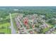 An aerial view showcasing a residential neighborhood with tree-lined streets and well-maintained homes at 1979 Spivey Village Dr, Jonesboro, GA 30236