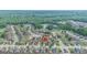 Expansive aerial view of a residential neighborhood, surrounded by lush trees at 1979 Spivey Village Dr, Jonesboro, GA 30236