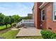 A well-maintained backyard deck and lush green grass with beautiful landscaping at 1979 Spivey Village Dr, Jonesboro, GA 30236