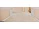 Spacious bonus room with neutral carpet and base molding at 1979 Spivey Village Dr, Jonesboro, GA 30236