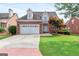 Attractive two-story brick home with a two-car garage and well-maintained landscaping at 1979 Spivey Village Dr, Jonesboro, GA 30236