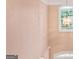 Two-story foyer with a transom window and a decorative light fixture at 1979 Spivey Village Dr, Jonesboro, GA 30236