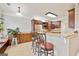 Spacious kitchen with ample cabinetry, granite counters and seating at breakfast bar at 1979 Spivey Village Dr, Jonesboro, GA 30236