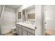 Bathroom featuring a double sink vanity and shower/tub at 11893 Aukerman Way, Hampton, GA 30228