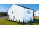 Exterior view of a modern home with a well-maintained lawn at 11893 Aukerman Way, Hampton, GA 30228