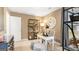 A study with a desk, shelving, and natural lighting at 11893 Aukerman Way, Hampton, GA 30228