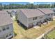 Aerial view of the backyard and neighborhood at 2060 Lanier Harbor Pt, Buford, GA 30518