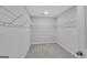 Walk-in closet space with wire shelving for organization and storage at 2060 Lanier Harbor Pt, Buford, GA 30518