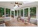 Relaxing sunroom with skylights and large windows at 770 Spalding Heights Dr, Atlanta, GA 30350