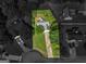 Aerial view highlighting the property and lot size, surrounded by lush greenery at 404 Northwind Pl, Stockbridge, GA 30281