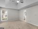 Bright bedroom with plush carpeting, natural light and neutral paint at 404 Northwind Pl, Stockbridge, GA 30281