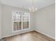Dining area with a chandelier and a large window at 404 Northwind Pl, Stockbridge, GA 30281