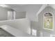 View of the foyer featuring an arched window and great natural light at 404 Northwind Pl, Stockbridge, GA 30281