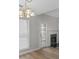 Living room featuring lots of natural light, a fireplace, and hardwood floors at 404 Northwind Pl, Stockbridge, GA 30281