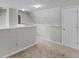 Loft space featuring neutral walls, plush carpeting, and nearby closet at 404 Northwind Pl, Stockbridge, GA 30281