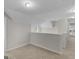 Carpeted loft area with neutral walls and natural light at 404 Northwind Pl, Stockbridge, GA 30281