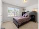 Bedroom with double bed, side table, and large windows at 4105 Vista Pointe Dr, Cumming, GA 30028