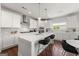 Contemporary kitchen with white cabinets, a center island, stainless steel appliances, and sleek pendant lights at 4105 Vista Pointe Dr, Cumming, GA 30028