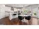 Bright and airy kitchen with a center island, pendant lighting, hardwood floors, and stainless steel appliances at 4105 Vista Pointe Dr, Cumming, GA 30028
