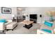 Cozy living room featuring neutral tones, comfortable seating, and modern entertainment setup, creating a relaxing ambiance at 4105 Vista Pointe Dr, Cumming, GA 30028