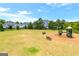 Community playground and open grassy area, perfect for outdoor activities and Gathering fun at 4105 Vista Pointe Dr, Cumming, GA 30028