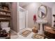 Cozy bathroom featuring a pedestal sink, glass-enclosed shower, and decorative accents at 109 National Way, Carrollton, GA 30116