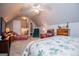 Spacious bedroom features vaulted ceilings and comfortable seating area with a ceiling fan at 109 National Way, Carrollton, GA 30116