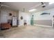 Spacious garage with ample storage, a refrigerator, and neutral tones that enhance the space at 109 National Way, Carrollton, GA 30116