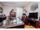 Elegant home office featuring a large desk, comfortable chair, and plenty of natural light for productivity at 109 National Way, Carrollton, GA 30116