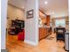 Open kitchen featuring hardwood floors and access to the living room and breakfast nook at 109 National Way, Carrollton, GA 30116